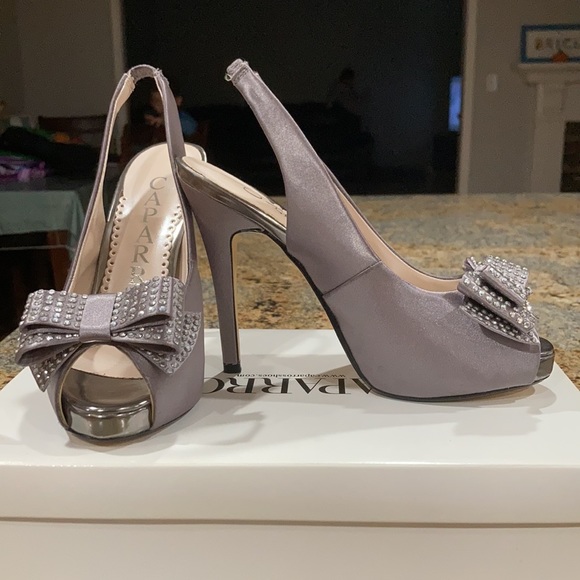 Caparros Shoes - Caparros platform heels.Style s9018 Betsey. The color is slate satin, size 5.5